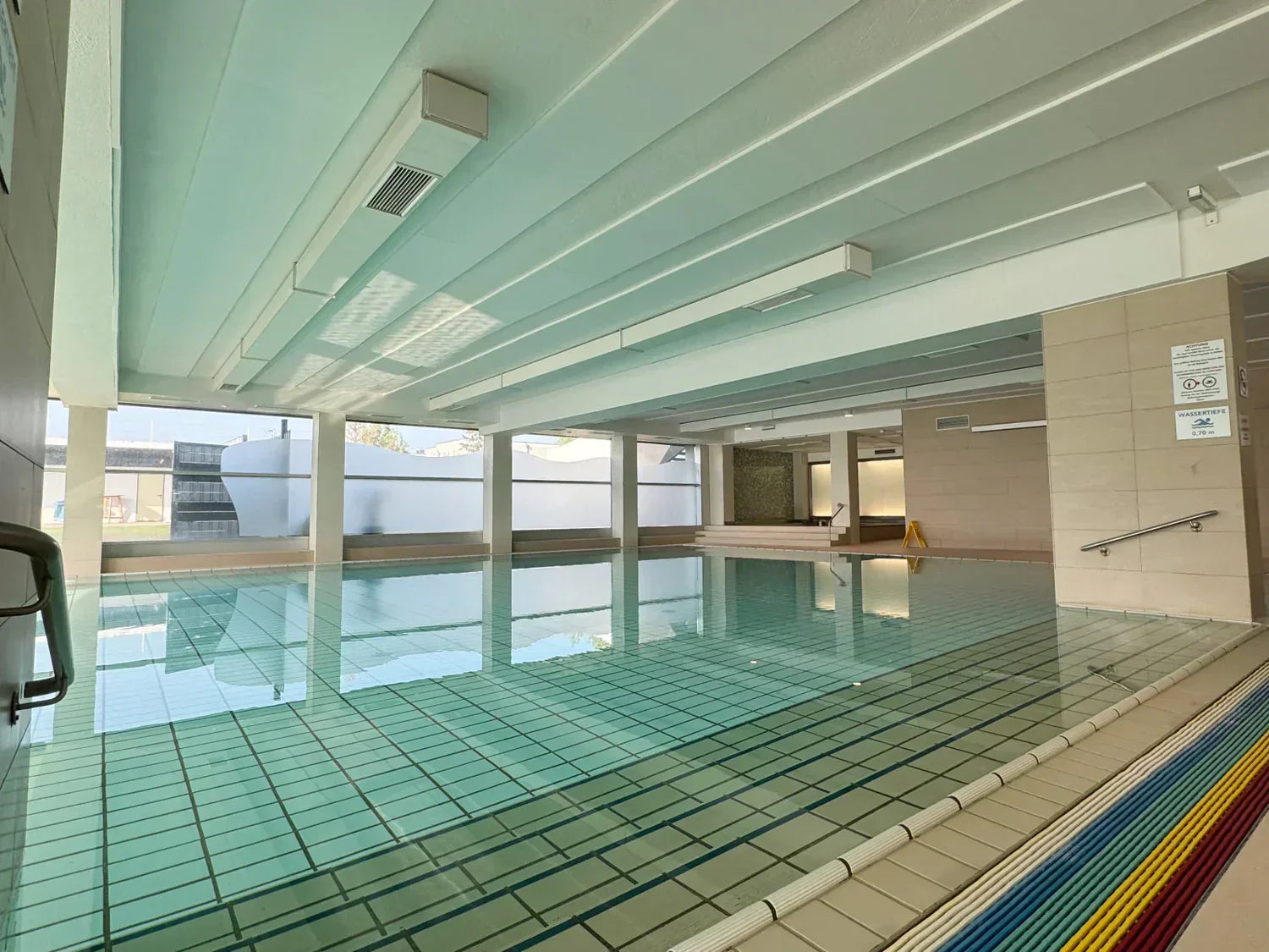 How to Reduce Echo in a Swimming Pool Area: Acoustic Solutions for Public Baths