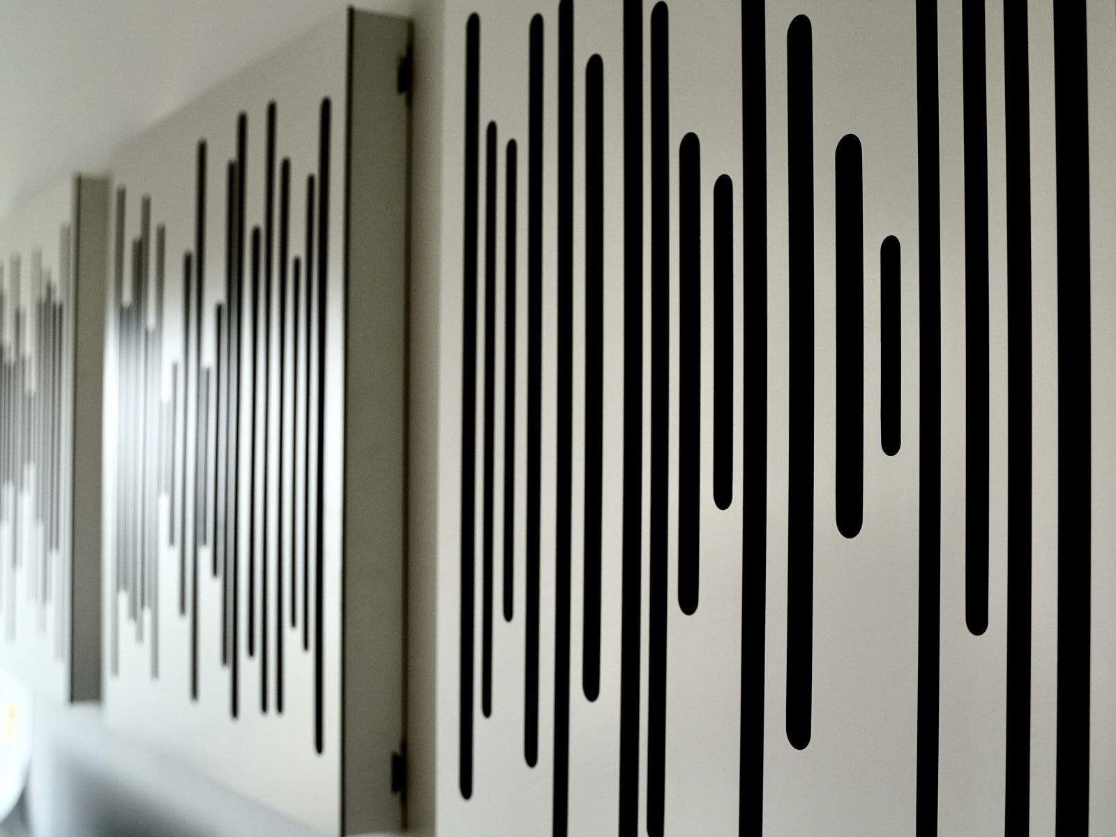 VicPattern in white matte engineered to absorb sound in walls and ceilings